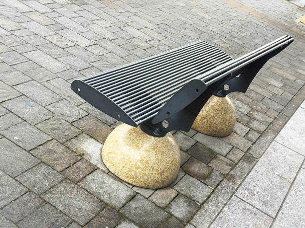 Empty metal bench in a public park