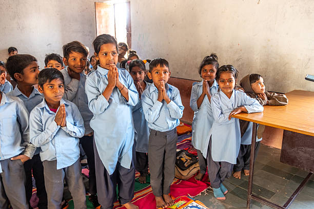 Jodhpur, India - February 15, 2024: children in primary school are praying in their classroom.