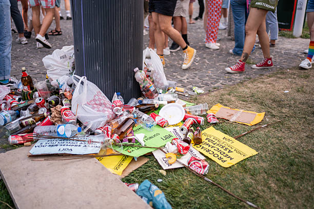 Lisbon, Portugal 17 June 2023 Participants in the LGBT pride parade in Lisbon celebrate diversity while leaving behind a significant amount of litter near a public area.