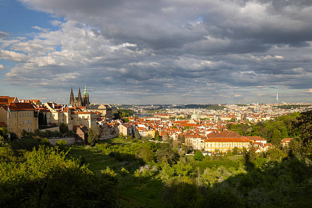 Prague's old town and cathedral from above, showcasing historical architecture under a cloudy sky