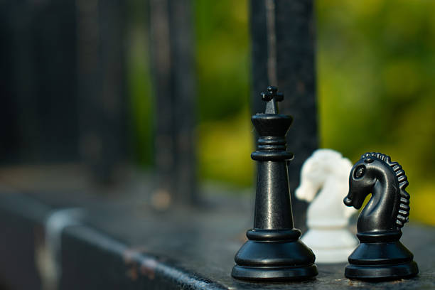 Chess pieces arranged as a metaphor for business strategy, planning and decision making. Conceptual image representing leadership, intelligence, competition, risk management and corporate thinking, ideal for business, marketing and education content.