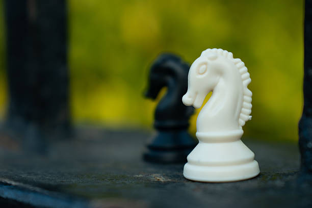 Chess pieces arranged as a metaphor for business strategy, planning and decision making. Conceptual image representing leadership, intelligence, competition, risk management and corporate thinking, ideal for business, marketing and education content.