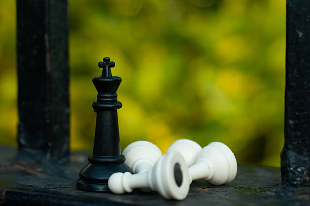 Chess pieces arranged as a metaphor for business strategy, planning and decision making. Conceptual image representing leadership, intelligence, competition, risk management and corporate thinking, ideal for business, marketing and education content.