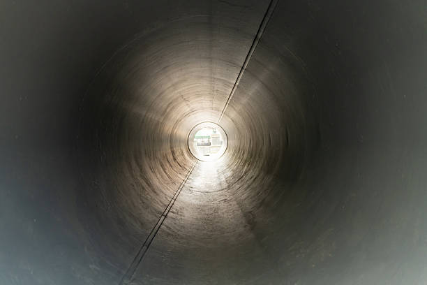 Tunnel; walkway; modern pipes; neon lights; floor; 3D illustration