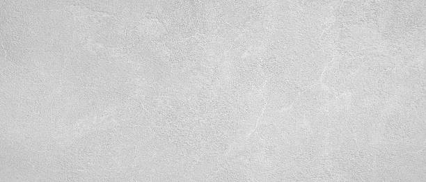 istock Rough full frame  textured stucco in white gray color. High resolution texture of plaster for 3d models, background, pattern, poster, collage, gift wrap, wallpaper 2259304479