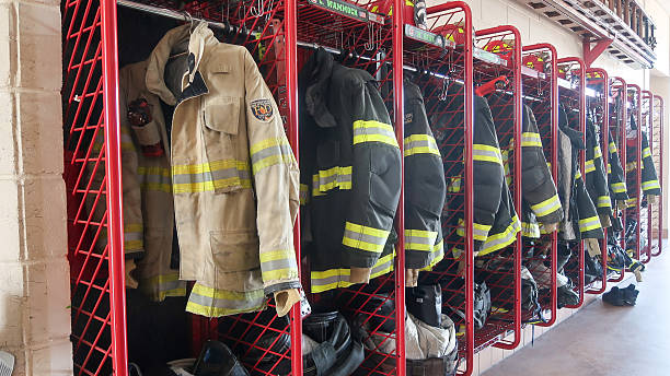 This photograph highlights the organized storage systems common in modern fire stations. The lockers, likely \