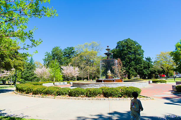 Macon, GA, USA, March 25, 2025: Landscape, the fountain of Tattnall Square park near downtown Macon.