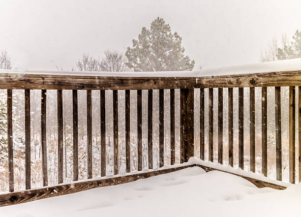 Enjoy the charming of the snow day on a deck.