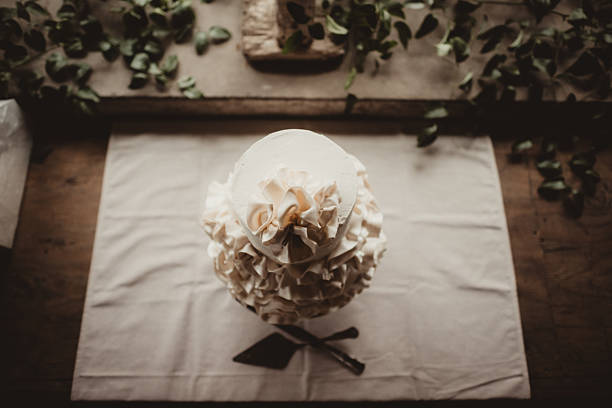 From above photo of wedding cake with ruffle icing