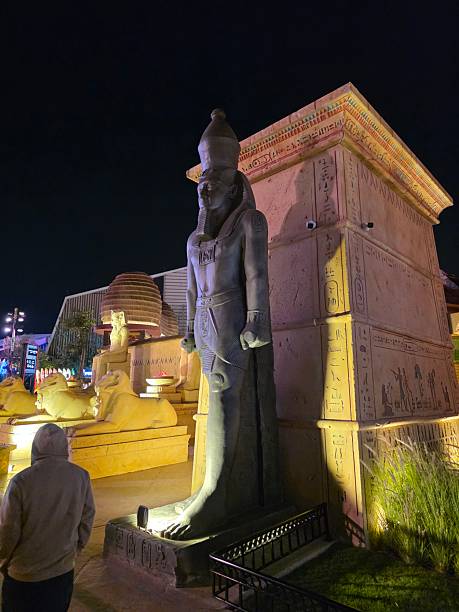 A stunning night scene of the replica Egyptian pyramids situated on Riyadh Boulevard. The structures, designed in the ancient Egyptian architectural style, are elegantly lit up at night.