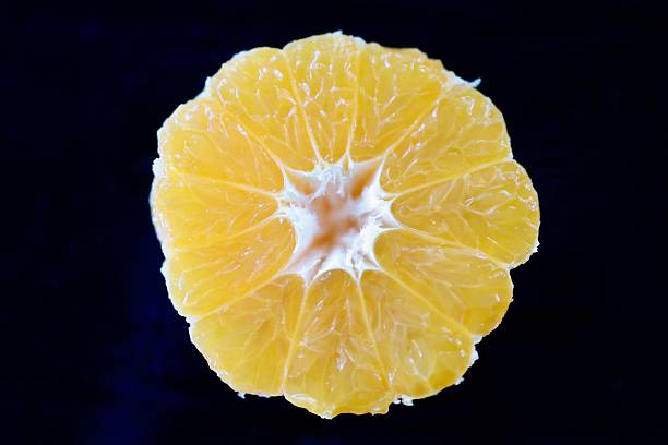 A freshly cut yellow watermelon reveals its bright, sunny flesh