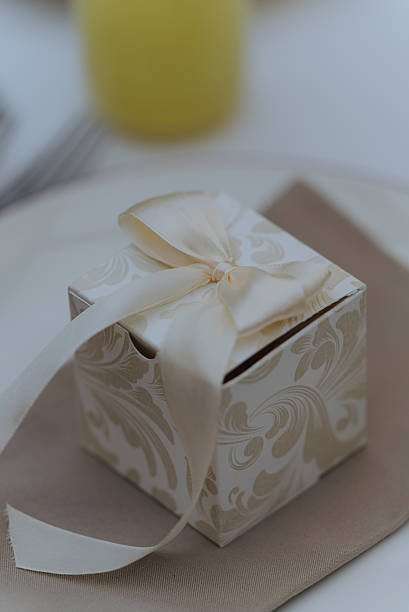 Bright collection of decorative gift boxes with heart designs and elegant bows in various colors. Perfect festive packaging for romantic or holiday celebrations.