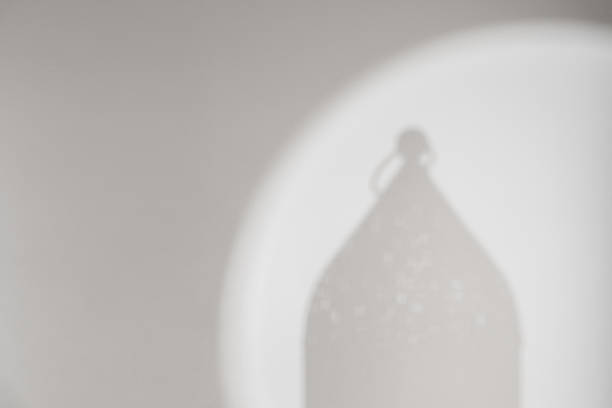 Eid Mubarak,Ramadan Kareem background banner with shadow lantern ornament on grey wall,Islamic design,Muslim backdrop window light