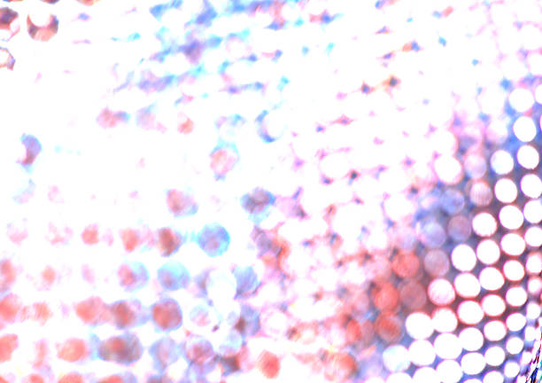 Metallic colors, bokeh, shimmering background. Shimmering fabric close-up. Unfocused