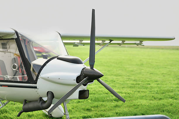 White small gyrocopter at the airfield