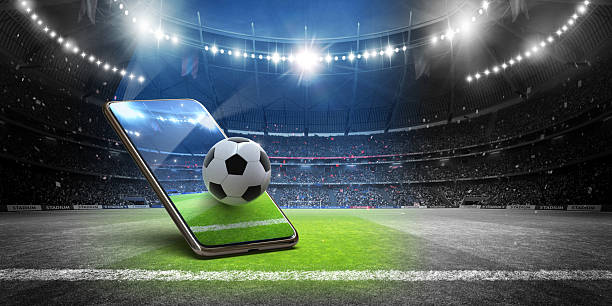 istock Immersive soccer experience on mobile device in the imaginary stadium. 2259427388