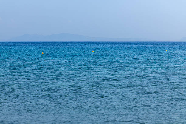 View of the beautiful blue sea at the Manganari beach in Ios Greece