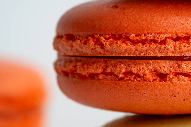 Elegant studio still life of assorted French macarons photographed on an isolated white background. Perfect for editorial features, gourmet branding, lifestyle food stories and premium packaging visuals.