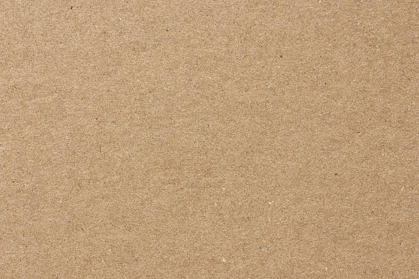 istock Textured brown cardboard paper surface with natural fibers and subtle speckled variations 2259498357