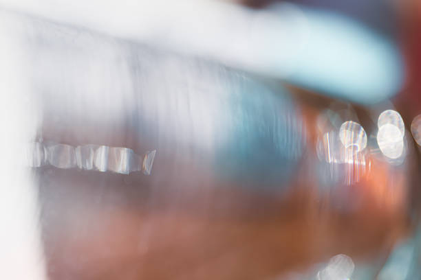 Abstract blurred background from light leak defocused bokeh. Modern glowing backdrop with sunlight overlay effect for presentation.