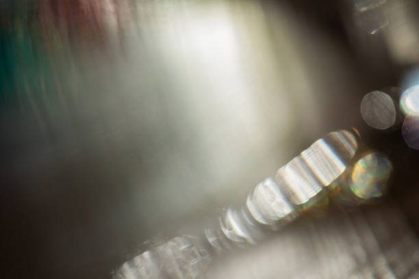 Light leak abstract background in dark colors from defocused flare and glare bokeh effect. Sunlight blurred overlay texture for modern presentation and branding.