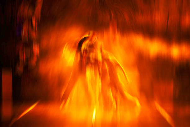 Abstract photographic artwork created with intentional camera movement, featuring fluid motion blur in warm red, orange and golden tones. Expressive fine art background with dynamic texture, energy and painterly atmosphere. Suitable for creative concepts, emotions, music, design and visual storytelling.