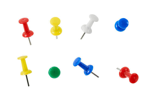 Colorful thumbtacks close up for background