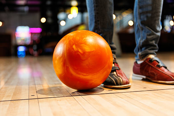 Preparing to strike on a bowling ball