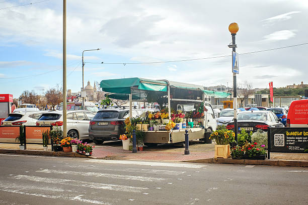 Mobile Flower Stall Selling Bouquets In A Parking Lot