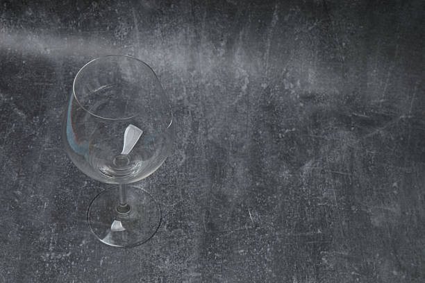 Broken glass of a glass on the background.