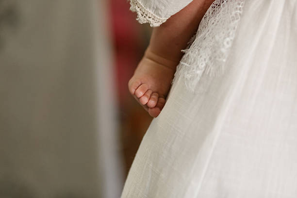 Baby Foot During Orthodox Baptism Ceremony