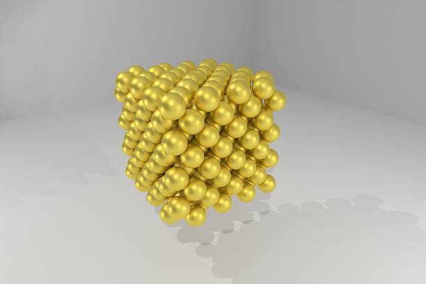 3D rendered cubic Gold nanoparticle at atomic scale in a cleanroom - concept for nanotechnology