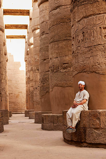 Ancient Egyptian royal palace or temple building with stone columns. Isolated 3D render.