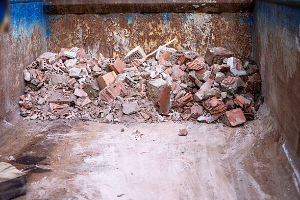 Building waste in an industrial skip