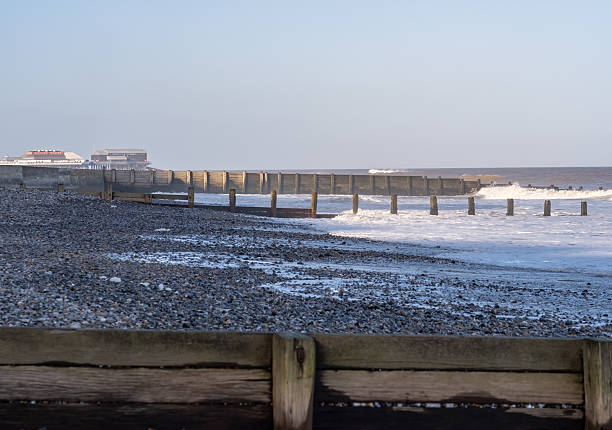 Cromer, Norfolk, UK - January 24 2026. High tide at Cromer beach, Norfolk coast. Captured on a hazy winter day