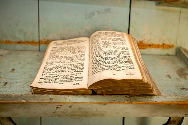 Open old stylish Slovak evangelical bible is placed in church at place for prayer, believer, spiritual symbol, religion, Lutheran.