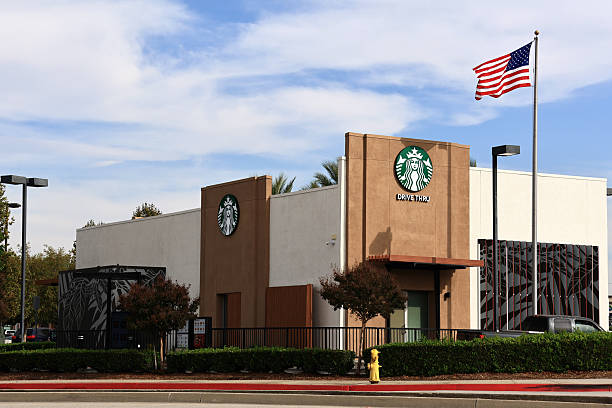 El Monte, California – November 11, 2025: Starbucks coffee shop with drive-thru, popular American coffee chain and casual café experience