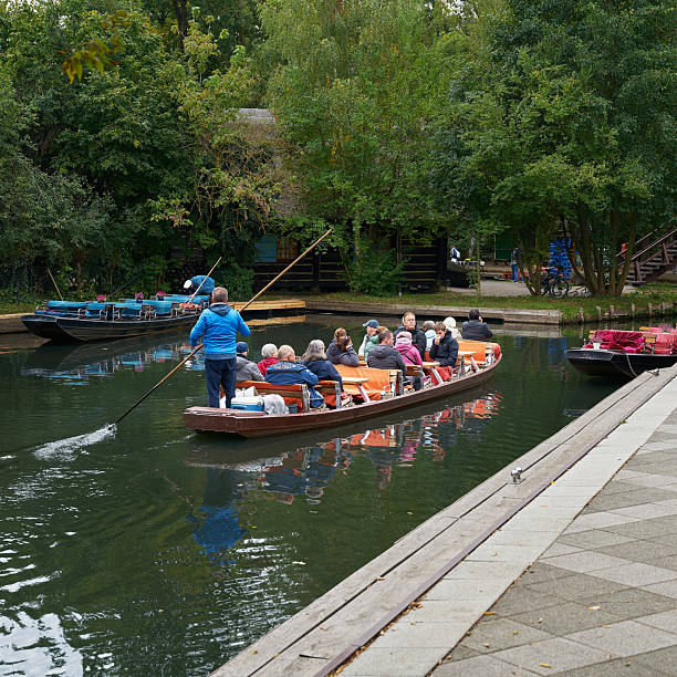 Lehde, Germany – October 01, 2025: Typical Spreewald punt, Spreewaldkahn, with tourists navigating the waterways in the Spreewald village of Lehde in Germany
