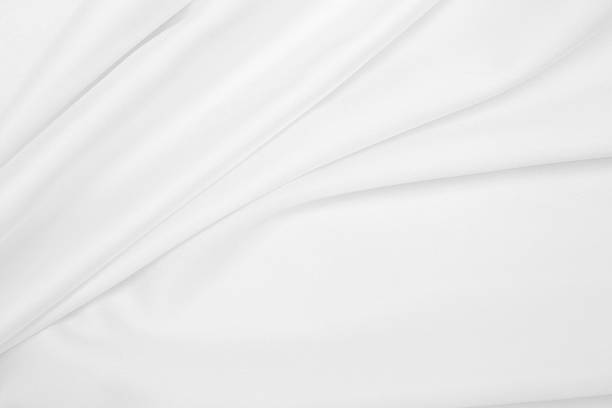istock Smooth elegant white silk or satin luxury cloth texture as wedding background. Luxurious background design 2259612752