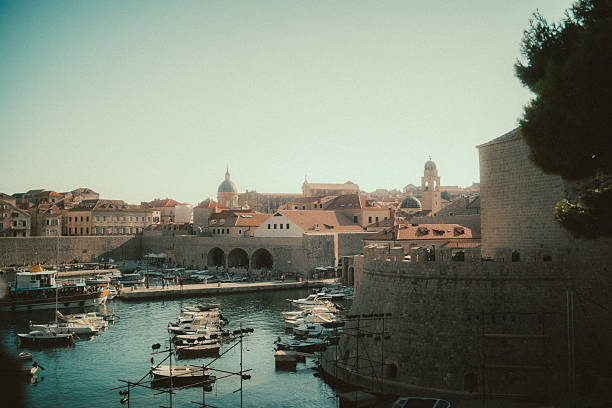 Summer view of Dubrovnik old town historic architecture stone buildings and coastal city atmosphere popular travel destination in Croatia