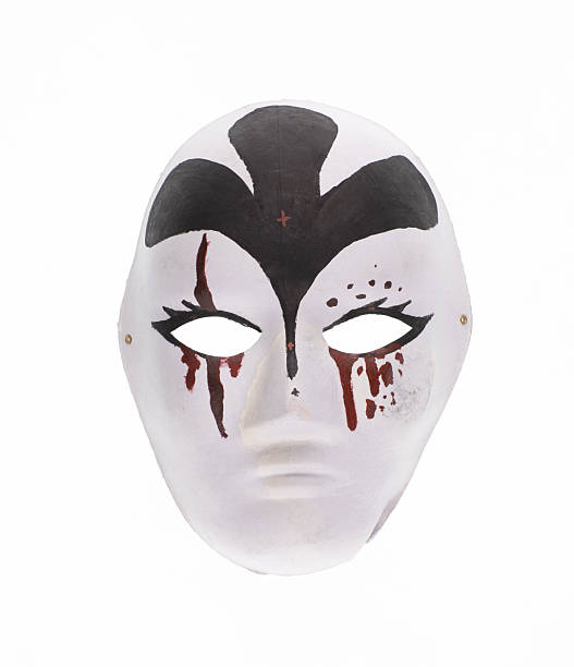 White paper mask with a blank expression, with plenty of texture and detail, cut out on a pure black background.
