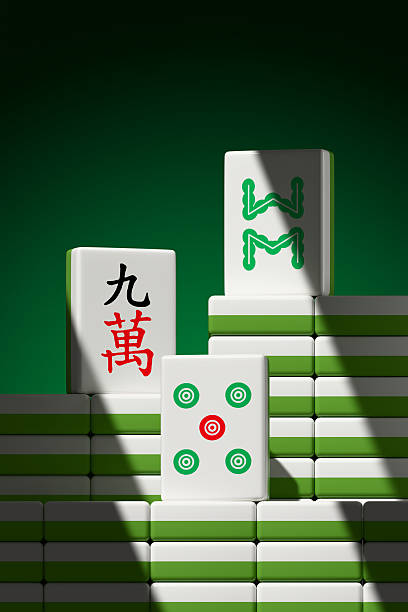 Traditional Chinese Game. Stacked Mahjong tiles on a green background. 3D illustration features sharp, dramatic lighting.