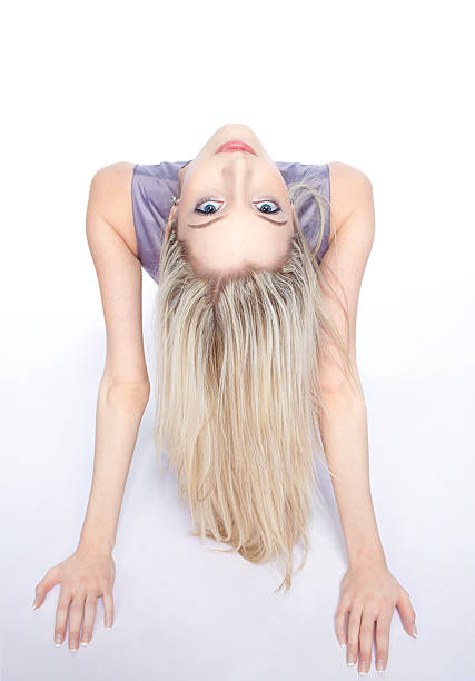 full-length portrait of beautiful  blonde female posing on white
