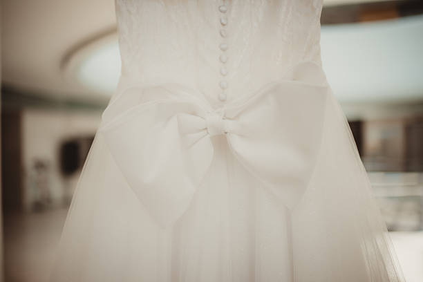 Wedding dress backside with buttons and large oversized bow