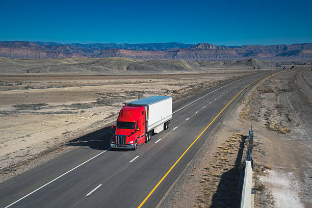 istock Trucking highway. Isolated desert transportation route 2259663029