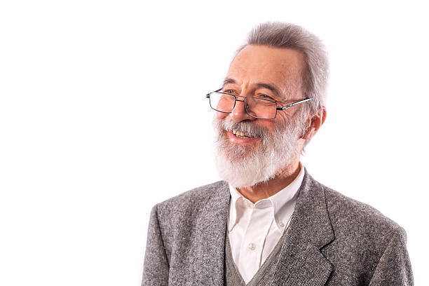 istock Senior man smiling with beard and glasses 2259682524