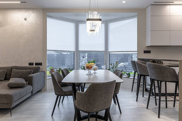 istock Open plan modern living and dining room with luxury furniture 2259685099