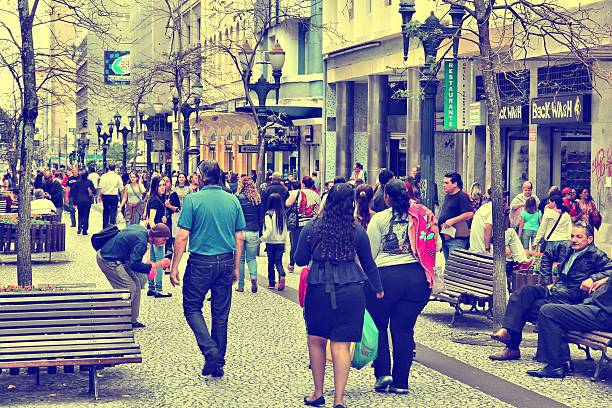 People shop at Avenida Luiz Xavier in Curitiba, Brazil. Curitiba is the 8th most populous city of Brazil with 1.76 million inhabitants.
