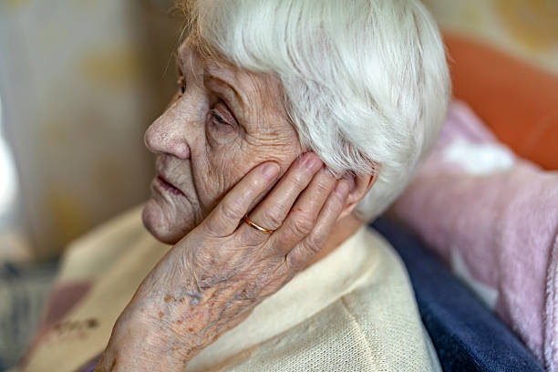 Senior woman suffering from earache