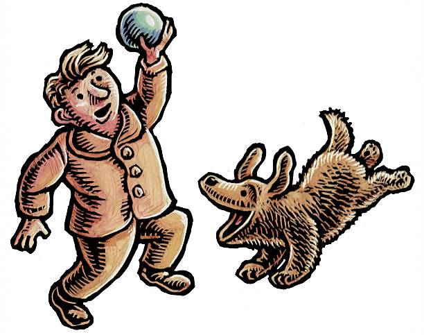 young boy holding ball and playing with his yellow dog